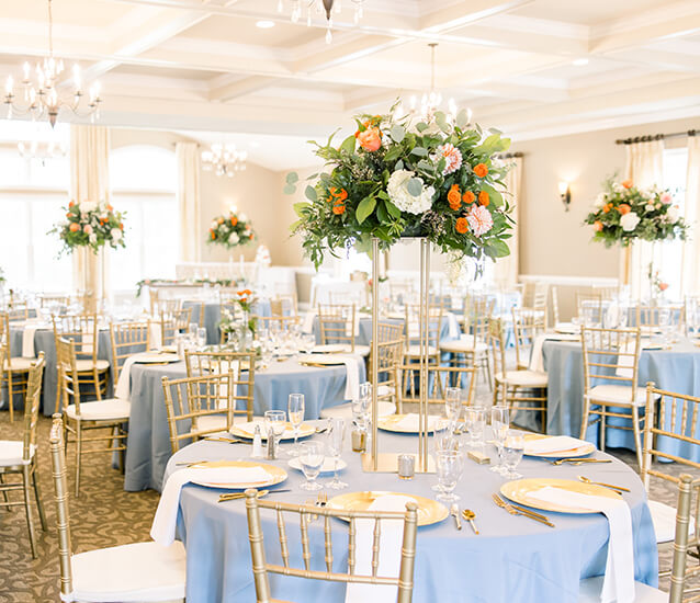 blue orange white wedding reception tables