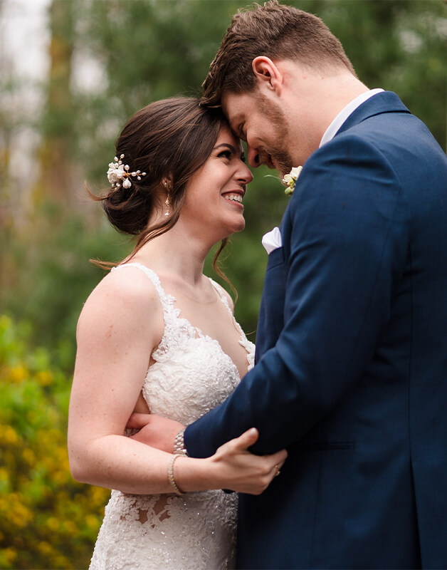 happy bride groom hugging