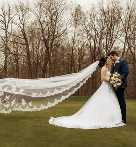 outdoor bride groom flowing veil
